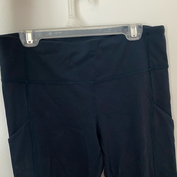 lululemon mid-rise teal leggings, with side pockets and zipper in back - Picture 3 of 3